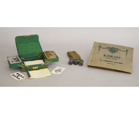 A vintage KidKord Record Album containing nine 78 rpm records, some being KidKord branded, featuring a selection of different