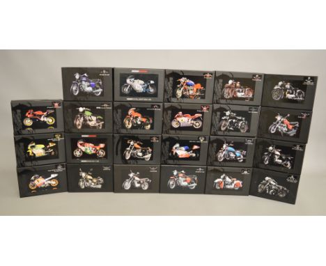 Twenty three boxed Minichamps diecast  Motorcycle models in 1:18 scale including vintage and more modern examples of bikes pr