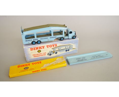 A boxed Dinky Toys 582 Pullmore Car Transporter in pale blue with fawn decks with six rivets to the side of the transporter. 