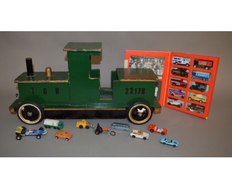 A large vintage wooden 'Pull-Along' Model Train on metal wheels with rubber tyres, approximately 60cm long, which has been re