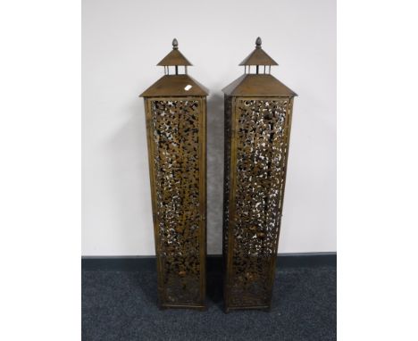 Two contemporary metal tea light holders 