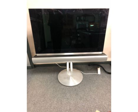 A Bang and Olufsen BeoVision 7 Mk V, 40 " screen, with separate soundbar speaker, on motorised adjustable stand, with Beo4 re