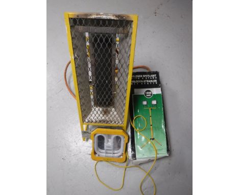 Two 110 volt work lights and boxed halogen spot light on stand 