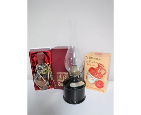 A Ye Whisky of Ye Monks Scotch Whisky decanter (boxed and sealed), boxed bottle of French pear liqueur and a bottle of Italia
