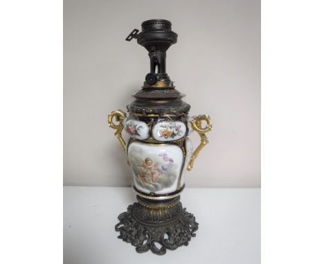 A Victorian brass and china oil lamp a/f