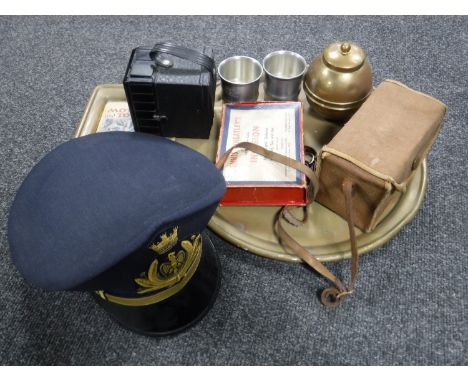 A tray of Navy hat, brass tray, British Empire exhibition caddy, cameras etc 