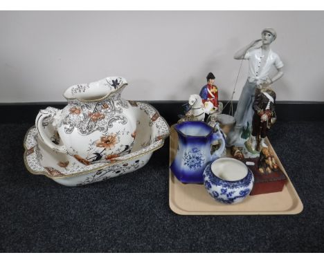A Doulton Burslem toilet jug and basin, tray of continental figures, Staffordshire figure - Wellington, Wedgwood swallow plan