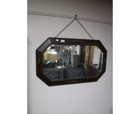 An Edwardian oak framed mirror, brass handled walking stick and a replica musket 