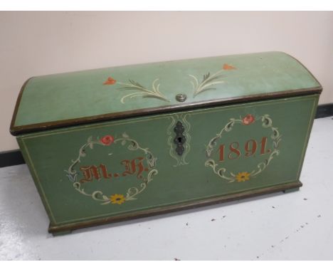 A late 19th century hand painted dome topped shipping trunk 