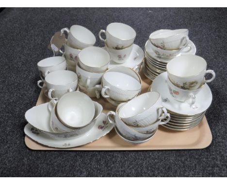An extensive Royal Copenhagen tea and dinner service (on three trays)