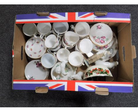 A box containing assorted tea china, Nao figure etc