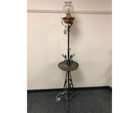 An Arts and Crafts copper and wrought metal standard lamp with etched glass shade, height 169cm 