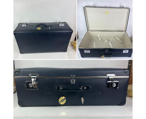 A large vintage navy blue suitcase with 2 keys by GLOBE TROTTER. Leather handle and chrome hardware.Condition Report:  Very g