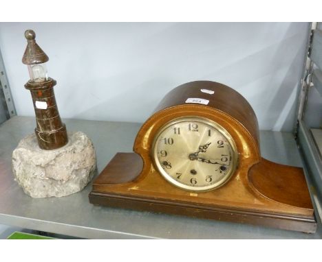 CIRCA 1920's MAHOGANY AND MOTHER O' PEARL INLAID MANTEL CLOCK, NAPOLEONS HAT SHAPE AND A MARBLE LIGHTHOUSE TABLE LAMP 