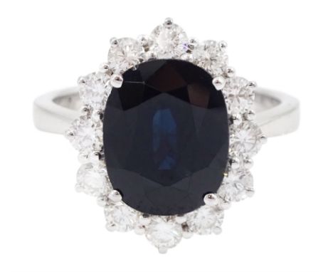 18ct white gold oval sapphire and round brilliant cut diamond cluster ring, sapphire approx 3.50 carat, total diamond weight 