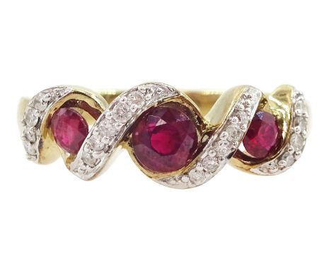 9ct gold three stone ruby and diamond crossover ring, hallmarkedCondition Report:Approx 3.35gm, size K-L, good condition