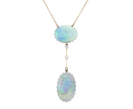 Early 20th century gold opal and diamond pendant necklace, two oval cabochon cut opals spaced by three milgrain set old cut d