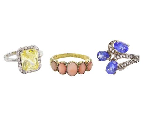 Silver-gilt five stone coral ring, silver tanzanite ring and one other silver stone set ringCondition Report: Silver-gilt siz