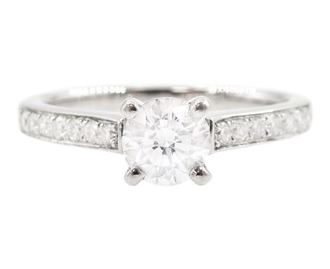 18ct white gold single stone round brilliant cut diamond ring, with diamond set shoulders, stamped 750, principal diamond 0.5