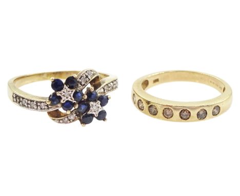 Gold rubover set seven stone fancy light brown diamond ring and a gold sapphire and diamond, double flower head crossover clu