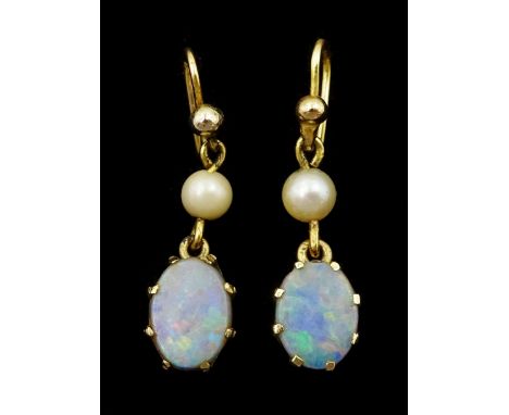 Pair of 9ct gold opal doublet and cultured pearl pendant earringsCondition Report:Approx 2.6gm, tested 9ct, length = 30mm, on