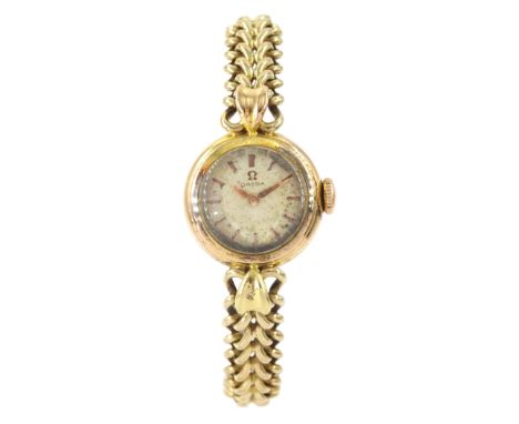 Omega ladies 18ct gold manual wind wristwatch, on 9ct gold link bracelet, hallmarkedCondition Report:18ct back case only appr