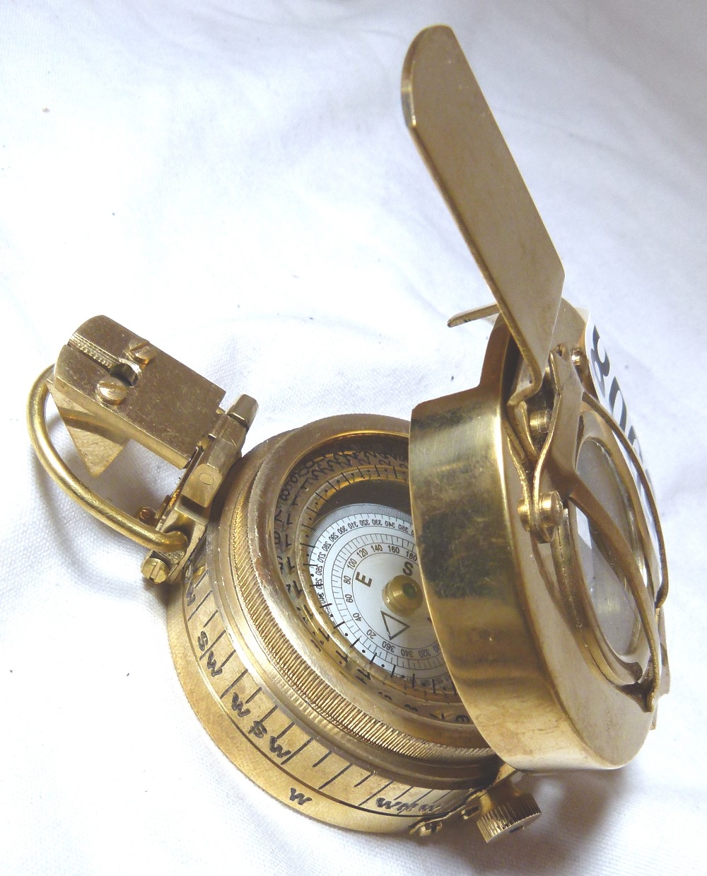 POLISHED COMPASS. Polished brass TG & Co Ltd London compass