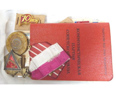 RUSSIAN ITEMS. Two Russian medals, passbook and ten enamel badges
