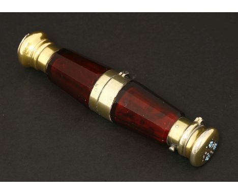 A Victorian ruby glass double-ended scent bottle and vinaigrette,the facet cut body with a central hinge opening to reveal a 