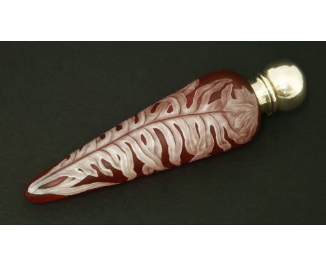 A cameo glass scent bottle,by Thomas Webb & Co, Stourbridge, the ruby glass body of elongated teardrop shape overlaid with a 