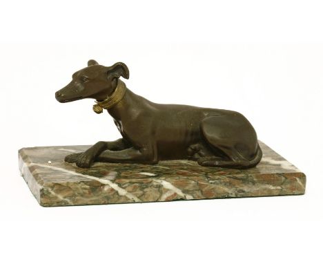 A bronze greyhound,19th/20th century, seated with a collar and bell on a veined marble base,base 21cm longProvenance:  The Es