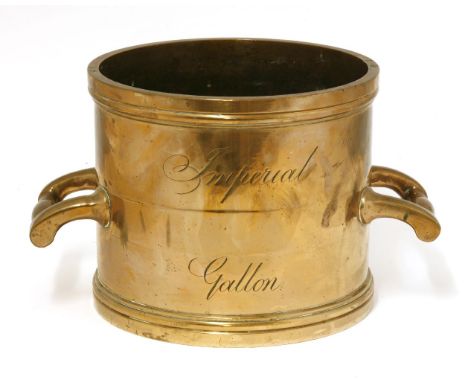 A bronze standard county measure,early 19th century, inscribed 'Imperial Gallon' and 'County of Norfolk', '1826' crossed out 