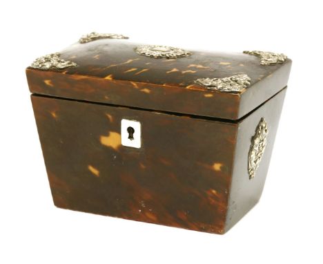 A collection of tortoiseshell items,19th century,a tea caddy, of sarcophagus shape with white metal mounts,13cm wide,a George