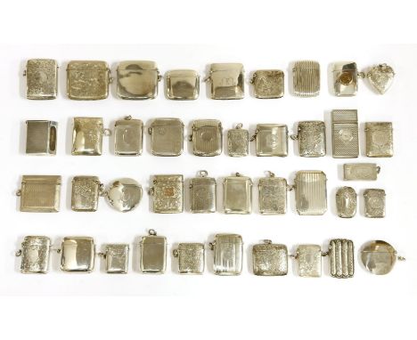 A collection of forty snuff boxes and vesta cases, 19th century and later, to include:a heart-shaped example,marks for Birmin
