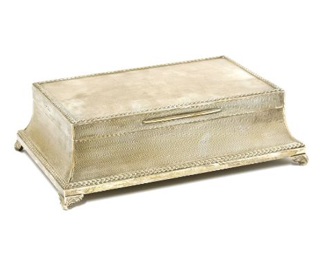 A silver cigar box,by Padgett & Braham Ltd., London 1937,with engine turned panels, a stiff leaf border, and an inscription t