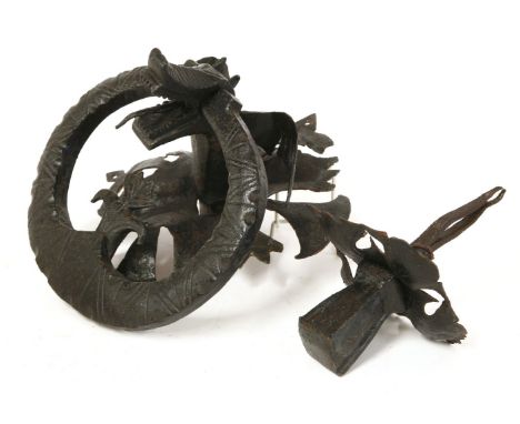 A large wrought iron dragon door knocker, 19th century,the ring 24cm diameter