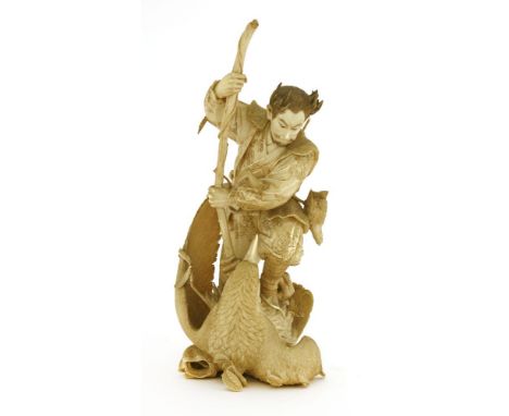 A Japanese ivory okimono,Meiji period, (1868-1912), of a hunter stabbing an eagle with a staff, possibly based on a ukiyo-e p