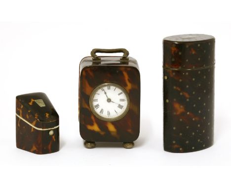 A small tortoiseshell clock,with an enamel dial, French movement and silver gilt hinges, London 1922,11cm,a Victorian oval to