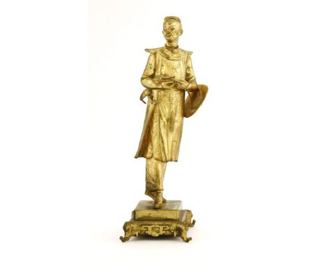 A French gilt bronze figure of a Chinese man,after Jean-François Lalouette, modelled holding a crocodile, on an elephant's tr