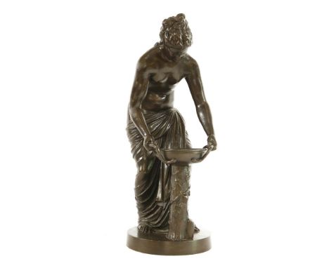 A bronze of a lady holding an urn,after the antique,54.5cm high