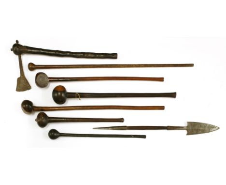 A collection of six knobkerries,longest 88cm,a short spear,69cm long, andan axe,56cm long (8)