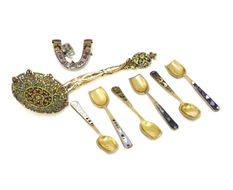 An American sterling silver spoon,with plique-à-jour and enamel decoration,13.5cm long, six Russian silver and enamel condime