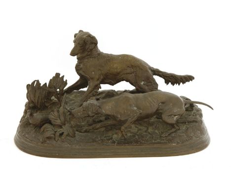 After Pierre-Jules Mêne (French 1810-1879),a bronze group depicting a pointer and setter flushing out a partridge, signed,40c