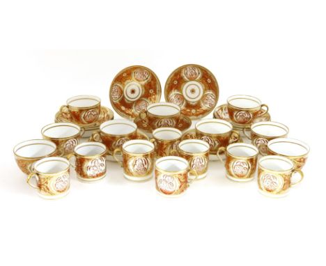 A Spode porcelain part tea and coffee service,early 19th century, each piece decorated with oval panels depicting a weeping s