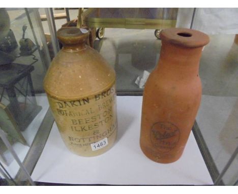 A Dakin Bros. stoneware beer jar and one other item.