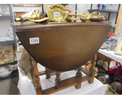 A small oak gate leg table. COLLECT ONLY.