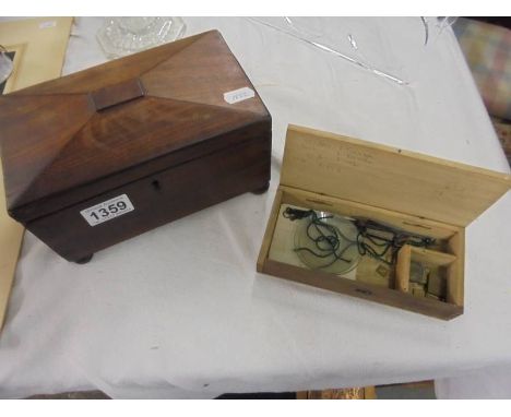 A Victorian mahogany tea caddy and a cased set of precious metal scales.