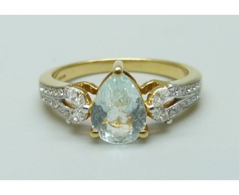 An 18ct gold, aquamarine and diamond ring, 4.3g, O 