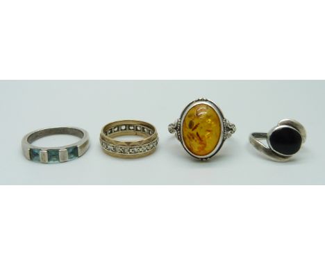 A 9ct gold and silver ring and three silver rings, J, H, O and Q, (4) 