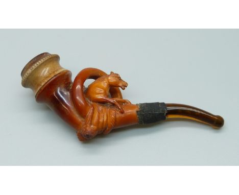 A carved pipe with horse detail, cased, mouthpiece/stem a/f 